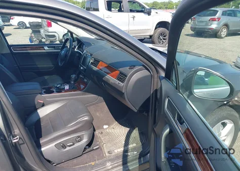 2014 Volkswagen Touareg 3.6L Lux z USA, uszkodzony, nr VIN WVGEF9BP1ED009269